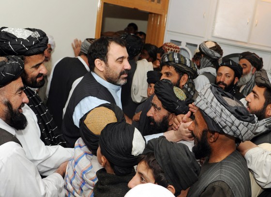 Image: Afghan supporters greet Ahmed Wali Karzai